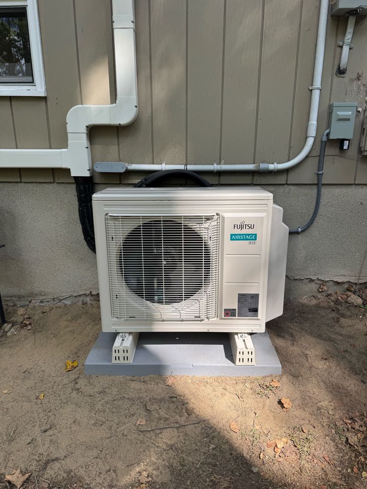 Installation of a new Fujitsu ductless mini split ac and heat pump with three indoor heads and one outdoor.