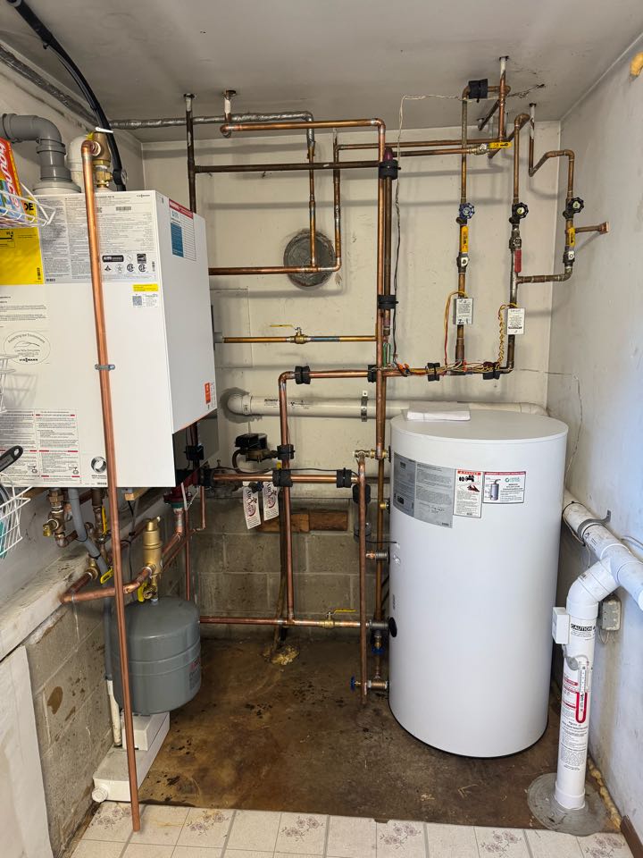 Oil to natural gas conversion of a high efficiency, Viessmann boiler and indirect water heater.