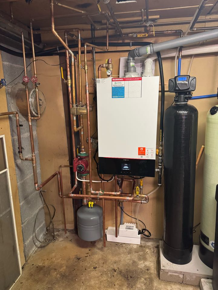 Oil to natural gas conversion of a high-efficiency Viessmann boiler and Combi unit.