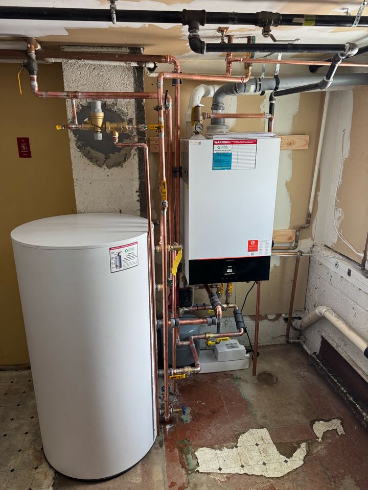 Natural gas installation and replacement of a Viessmann hot water boiler with indirect water heater.