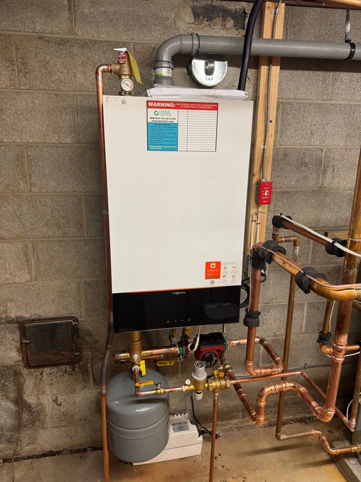 Oil to natural gas conversion of a high efficiency, Viessmann boiler and indirect water heater.