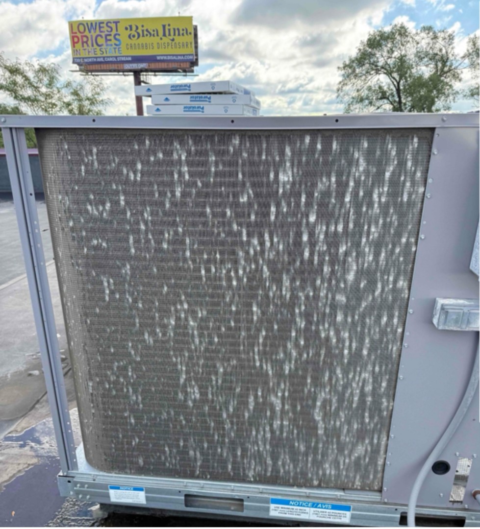 No heat Carrier roof top unit commercial service.   Replaced filters cleaned unit, found bad flame sensor.  Installation of hail guards due to hail damage on Carrier roof top unit.  
