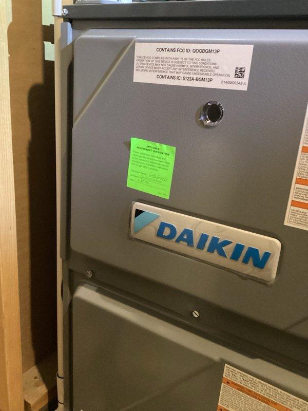 Completed full HVAC system installation including Daikin DR97MC0804CN furnace, CAPEA4830C3 outdoor condensing unit, and DH7VSA4210 air handler. Installed Daikin One thermostat for system control, mounted outdoor unit on elevated stand with snow legs for proper drainage and protection, and installed condensate pump (CCP) for moisture removal. All equipment tested and operational, system commissioned and verified for proper airflow and refrigerant charge.