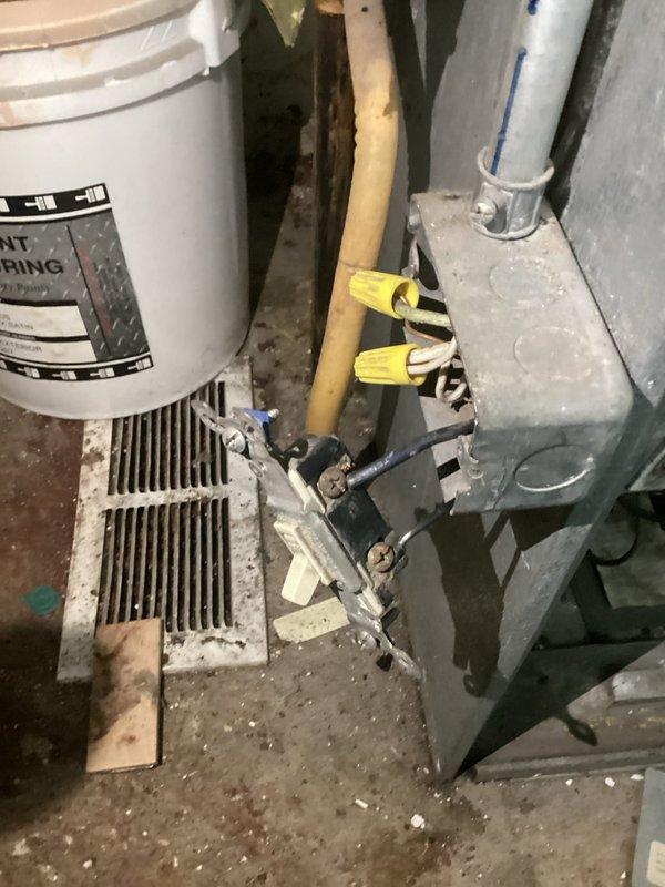 Responded to service call regarding HVAC system malfunction following water heater installation by plumber. Upon arrival, found disconnected electrical wiring at furnace location where plumbing work had been performed. Inspected Corsaire furnace unit and associated components in utility area, identifying improperly reconnected switch wiring with exposed wire nuts and loose connections at junction box. Restored proper electrical connections, secured all wiring to code, and tested system operation to verify furnace functionality. System returned to normal operation with all safety switches functioning correctly.