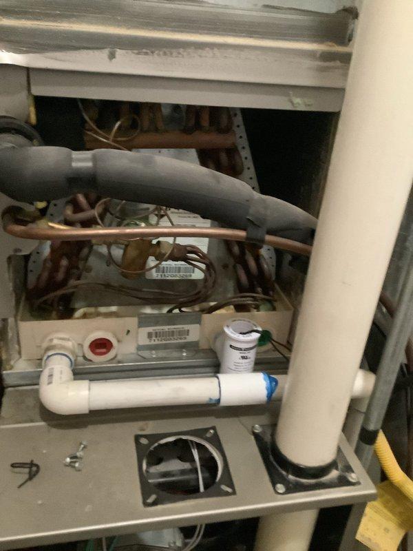 Completed Cool 10+ preventive maintenance service on 2012 Carrier air conditioning system. Performed comprehensive system inspection including checking refrigerant levels, electrical connections, capacitor operation, contactor condition, and airflow measurements. Inspected condensate drain system and verified proper drainage from evaporator coil through PVC drain lines. Cleaned condenser coil, checked blower motor operation, and tested thermostat functionality. Verified system is cooling properly and operating within manufacturer specifications. All components functioning as designed with no immediate repairs required at this time.