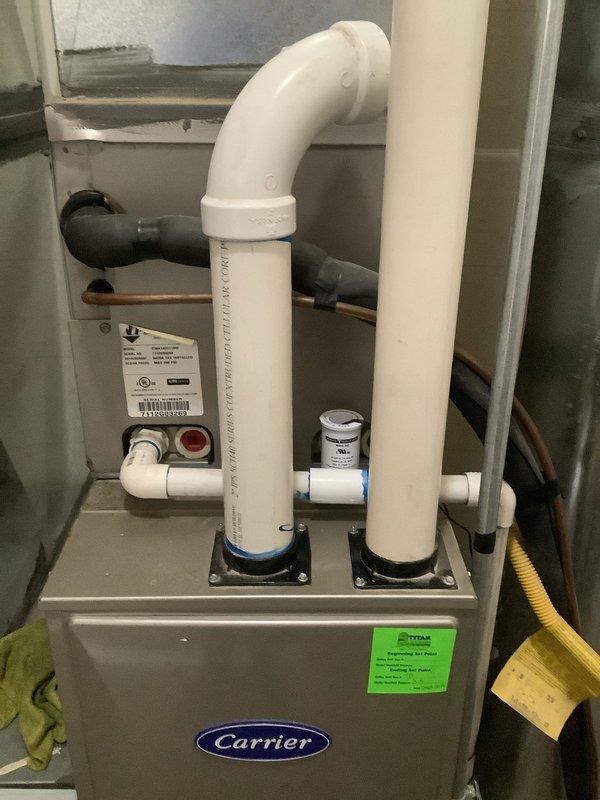 Completed Cool 10+ preventive maintenance service on 2012 Carrier air conditioning system. Performed comprehensive system inspection including checking refrigerant levels, electrical connections, capacitor operation, contactor condition, and airflow measurements. Inspected condensate drain system and verified proper drainage from evaporator coil through PVC drain lines. Cleaned condenser coil, checked blower motor operation, and tested thermostat functionality. Verified system is cooling properly and operating within manufacturer specifications. All components functioning as designed with no immediate repairs required at this time.