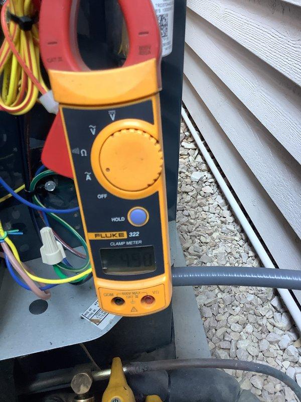 Performed Gold Cooling Maintenance on single system located on east side of house. Completed comprehensive tune-up including electrical diagnostics using clamp meter to verify proper amperage draw and system performance. Measured and documented temperature and humidity readings at unit, recording 67.5°F discharge air temperature. Inspected all electrical connections, wiring, and wire nuts for secure terminations. Evaluated refrigerant line connections and brass fittings for proper operation. Changed furnace filter with 16x25x1 replacement as requested. All electrical measurements within normal operating parameters and system operating efficiently upon completion of maintenance.