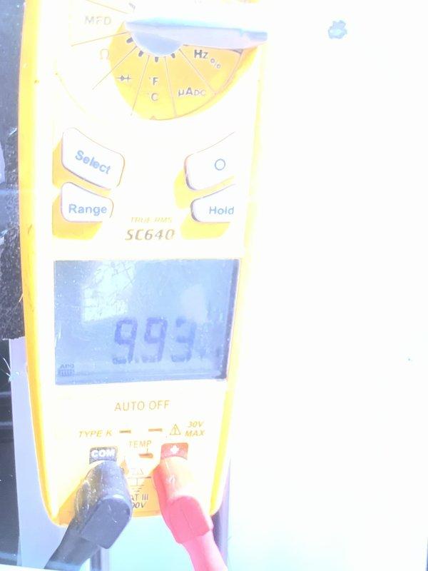 Performed preventative maintenance tune-up on a 5-9 year old Coleman air conditioning unit located in the backroom. Coordinated with mall office to obtain roof access keys prior to service. Conducted comprehensive system inspection, checked refrigerant levels, and measured system temperatures using digital multimeter. Inspected evaporator coils and noted moderate dust and debris accumulation on corrugated fins requiring future cleaning attention. All operational parameters within normal range, unit operating properly at time of service completion.