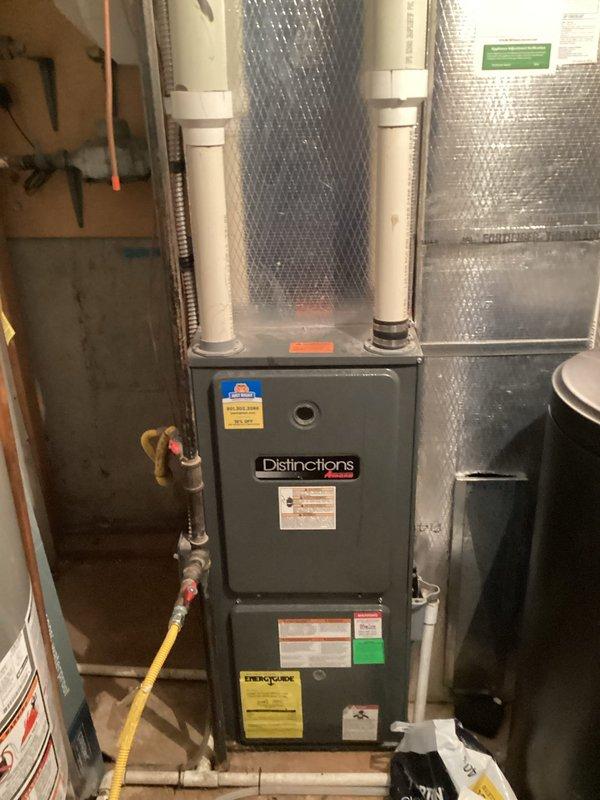 Completed Comfort Care Plan monthly membership maintenance visit on single HVAC system. Performed comprehensive cooling system tune-up on Distinctions brand furnace with air conditioning unit located in basement, verified all components operating within manufacturer specifications, inspected ductwork connections and PVC condensate lines, confirmed gas line connections secure, and documented system information including Comfort Solutions warranty details for member records.