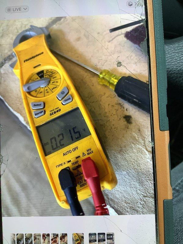 Responded to service call for gas fireplace with pilot light and ignition failure. Upon arrival, removed fireplace door assembly to access burner compartment and control components. Performed diagnostic testing using clamp meter to verify electrical continuity and proper voltage to ignition system. Identified faulty pilot assembly preventing ignition. Cleaned pilot orifice, tested thermopile output, and verified gas valve operation. Reassembled fireplace door and confirmed proper ignition sequence and flame operation before completing service.