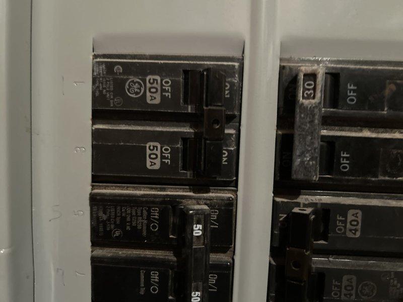 Conducted comprehensive HVAC system evaluation for proactive replacement of 22-23 year old equipment currently functioning without issues. Assessed existing compressor unit located on south side of property and furnace system positioned in lower level. Documented electrical panel configuration including circuit breaker specifications with 30A and 50A breakers serving HVAC equipment. Provided complete system replacement estimate to address aging infrastructure before winter season, with homeowner requesting completion prior to heating season demands.