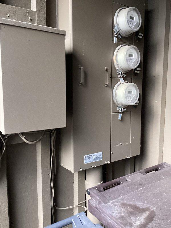 Conducted on-site evaluation for complete HVAC system installation at residential property currently without air conditioning. Assessed existing furnace and air handler setup in utility room, documented current heating infrastructure and electrical service capacity with three-meter configuration at exterior panel. Provided equipment options including traditional central air system and ductless mini-split alternatives with various room configurations for planned spring/summer installation timeline.