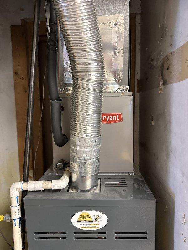 Responded to service technician referral for residential HVAC system evaluation. Property equipped with dual-zone cooling system consisting of an older 1992 compressor unit and newer Bryant furnace, plus secondary unit providing limited cooling coverage. Conducted on-site assessment and documented existing equipment configuration including Bryant furnace installation and Goodman furnace unit in separate location. Provided temporary portable cooling solution to maintain comfort while customer evaluates replacement options for both systems.