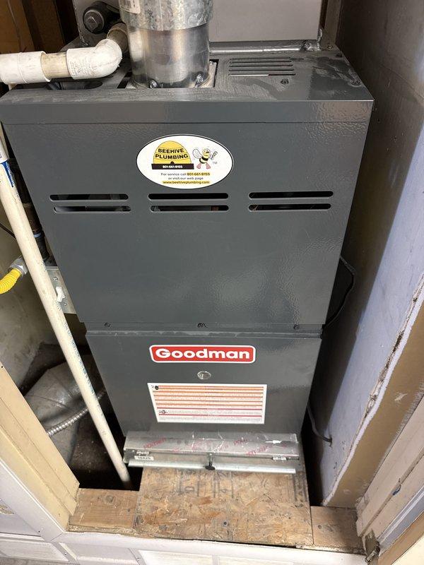 Responded to service technician referral for residential HVAC system evaluation. Property equipped with dual-zone cooling system consisting of an older 1992 compressor unit and newer Bryant furnace, plus secondary unit providing limited cooling coverage. Conducted on-site assessment and documented existing equipment configuration including Bryant furnace installation and Goodman furnace unit in separate location. Provided temporary portable cooling solution to maintain comfort while customer evaluates replacement options for both systems.