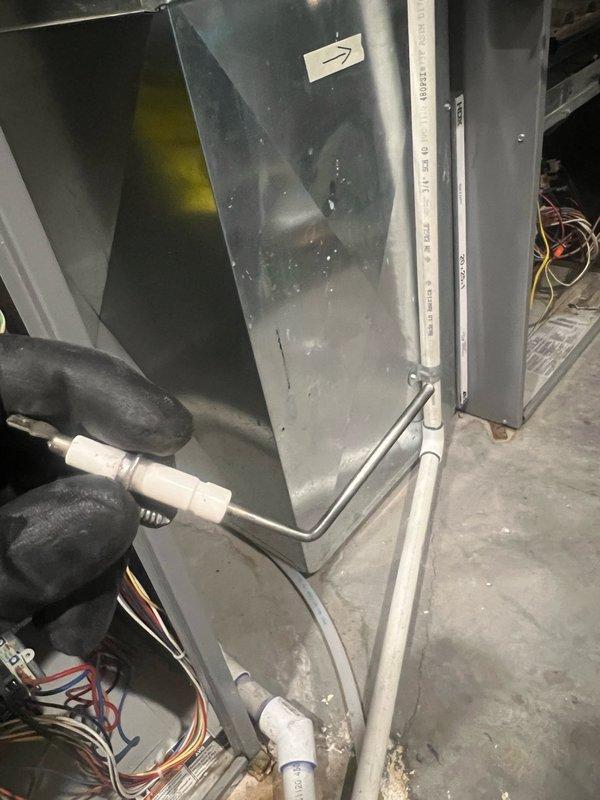 Completed annual heating maintenance on one HVAC system as part of membership service agreement. Performed comprehensive inspection of furnace unit located in downstairs mechanical room, including visual assessment of air handler cabinet, refrigerant line insulation integrity, and condensate drain system. Verified electrical connections and wiring harnesses for proper termination and condition. Conducted amperage draw testing using clamp meter, recording operating current of 25.1 amps to confirm system performance within manufacturer specifications. No customer-reported issues or operational concerns identified during visit. System found operating normally with all components functioning as designed.