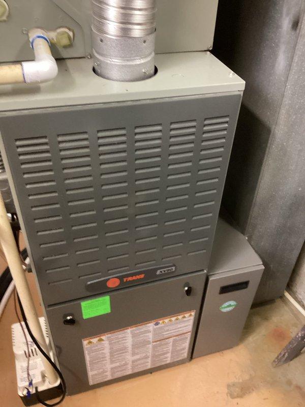 Conducted estimate visit for 2010 Trane furnace system following recent blower motor module failure. Performed thorough inspection of existing equipment, documenting current condition with interior and exterior photographs showing blower assembly, wiring harnesses, control board, and overall system configuration. Provided comprehensive replacement options including furnace-only replacement estimate and full HVAC system replacement estimate per customer request.
