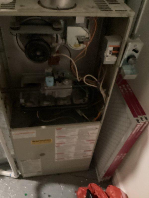 Conducted tech lead evaluation for complete furnace and air conditioning system replacement. Assessed existing aging Trane outdoor condenser unit and indoor furnace equipment, documented current system configuration including blower assembly, refrigerant lines, electrical connections, and control components. Photographed both indoor and outdoor units to support replacement estimate preparation, noting that homeowner has elected to replace rather than continue repairs on the aged HVAC system.