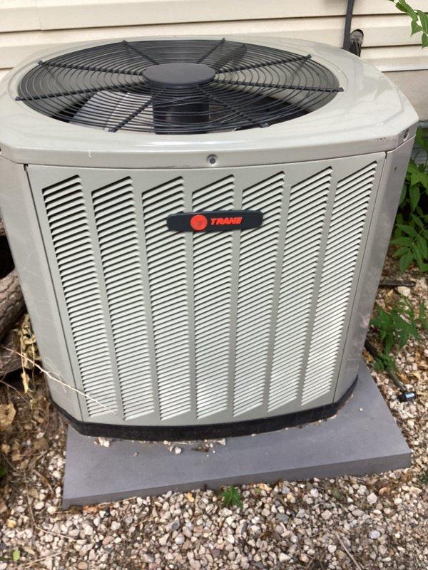 Conducted tech lead evaluation for complete furnace and air conditioning system replacement. Assessed existing aging Trane outdoor condenser unit and indoor furnace equipment, documented current system configuration including blower assembly, refrigerant lines, electrical connections, and control components. Photographed both indoor and outdoor units to support replacement estimate preparation, noting that homeowner has elected to replace rather than continue repairs on the aged HVAC system.