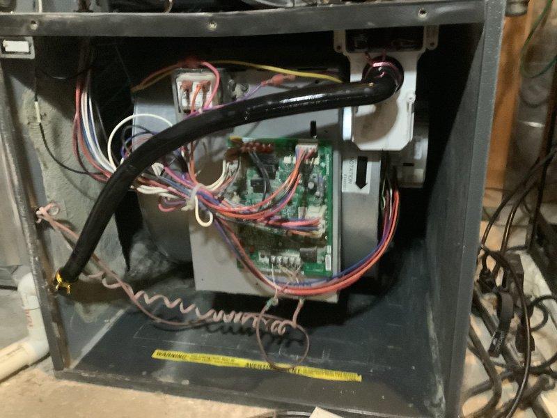 Completed comprehensive maintenance tune-up on 7-year-old HVAC system located in basement. Performed standard cleaning and inspection of air handling unit, control board, and electrical connections. Documented heavy frost accumulation in plenum chamber indicating potential airflow restriction or refrigerant issue requiring future attention. Inspected circuit board wiring, verified all connections secure, and confirmed system operational. Filter size determined for customer records.