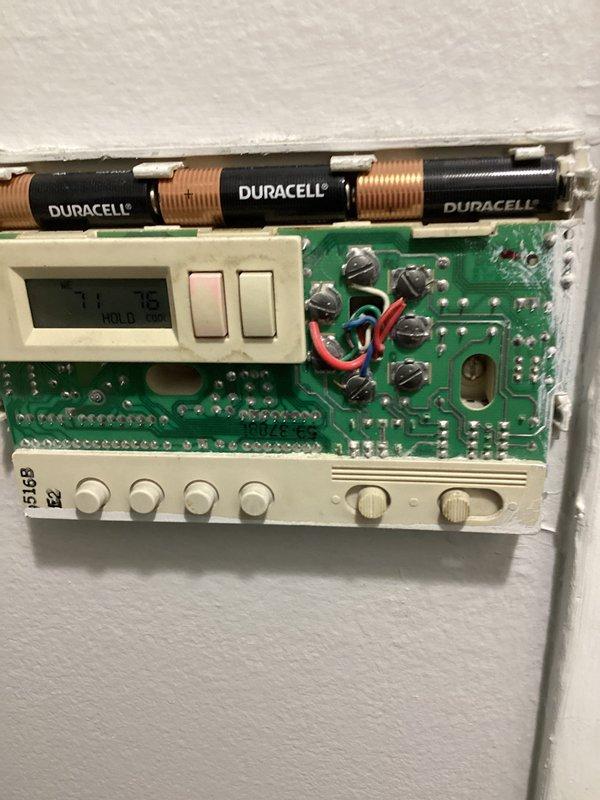 Performed comprehensive assessment of aging 16-year-old furnace system experiencing motor failure following previous repair history. Documented existing HVAC equipment configuration including furnace unit, flexible aluminum ductwork, and wall-mounted thermostat with digital display and battery backup. Provided replacement estimate for complete system upgrade due to cumulative repair costs and declining equipment reliability.