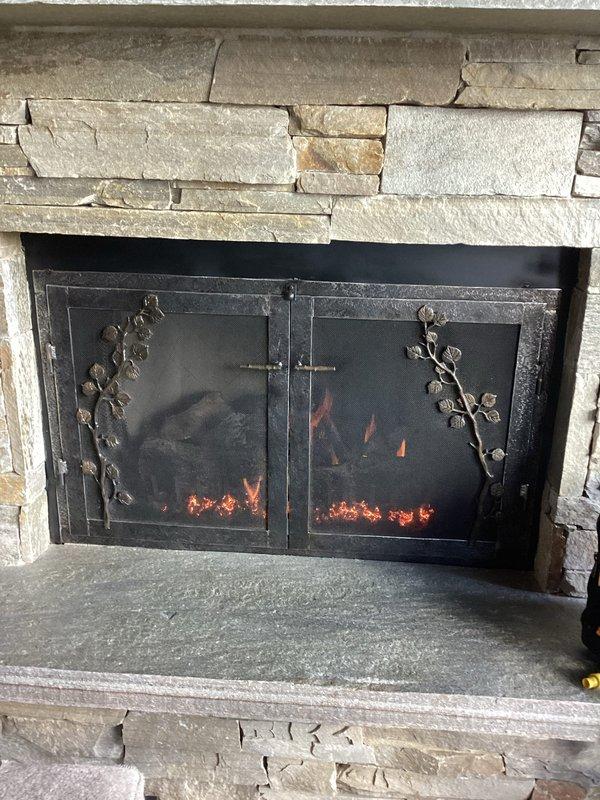 Responded to service call for two non-functioning gas fireplaces located on main floor and basement of residence, both units approximately 10-12 years old. Upon inspection, diagnosed ignition system failures on both appliances. Performed troubleshooting procedures, cleaned pilot assemblies, inspected gas valve operation, and verified proper gas flow to burners. Restored functionality to both fireplaces, confirmed successful ignition sequences, and verified flame patterns and safety controls were operating within manufacturer specifications. Both units tested and left in proper working condition.