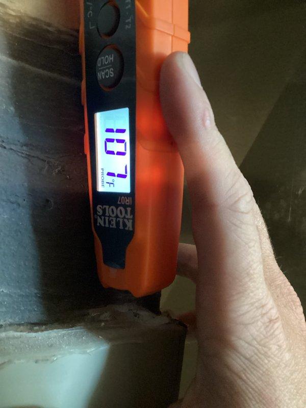 Completed annual heating maintenance service as part of the Comfort Care maintenance plan. Performed comprehensive furnace tune-up and inspection of all HVAC equipment in basement mechanical room, including blue/gray furnace unit with PVC venting system and beige air handler. Conducted temperature differential measurements using infrared thermometer, recording supply air temperature readings to verify proper system operation. Inspected all associated components including ductwork, copper piping, expansion tank, and electrical connections. System operating within normal parameters upon completion of maintenance service.