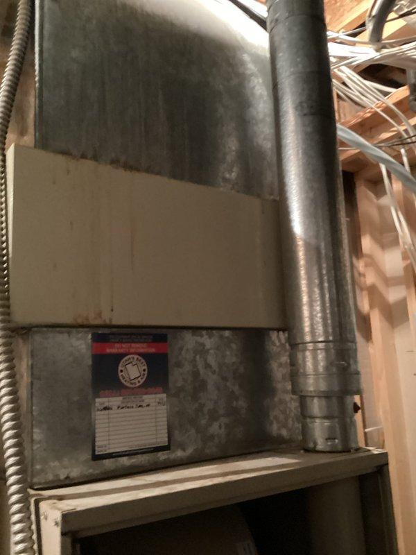 Responded to service tech referral for 34-year-old basement furnace unit experiencing intermittent operation and requiring component replacement. Performed comprehensive system assessment, completed load calculations totaling 36,006 BTUs indicating 3-ton capacity requirement, documented existing equipment condition with photos showing galvanized metal air handler with aging components, and provided estimate for necessary repairs or replacement options.