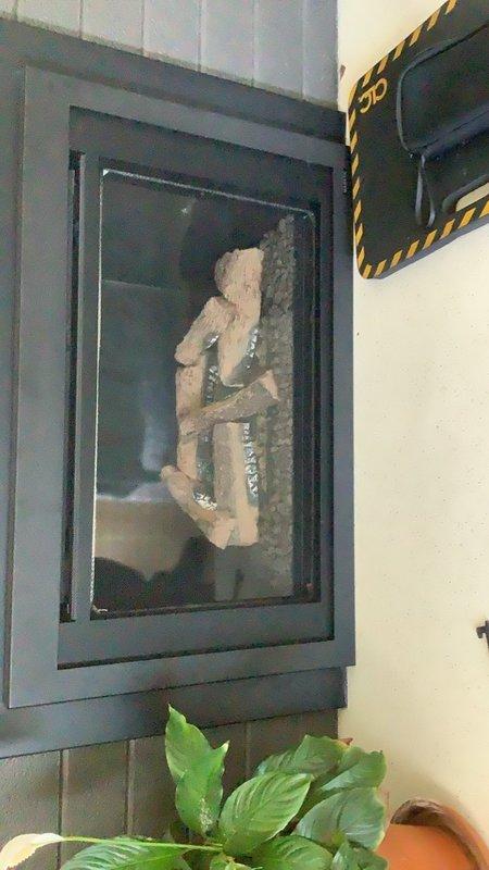 Responded to service call for 5-year-old gas fireplace with recurring faint gas odor concerns. Performed comprehensive safety inspection of gas fireplace system including visual examination of gas supply lines, connections, and venting components. Conducted leak detection testing at all gas connection points using appropriate detection methods to identify potential gas leaks. Inspected fireplace burner assembly, pilot light system, and gas valve operation for proper function and safety compliance. Examined venting system and flue for proper draft and clearance, checking for blockages or deterioration that could affect combustion air flow. Assessed firebox condition, logs, and ember bed placement for proper configuration. Verified all safety controls including oxygen depletion sensor and flame sensing devices were functioning correctly. Checked for proper gas pressure at appliance and confirmed manufacturer specifications were met. Inspected flexible gas connector and shutoff valve acce