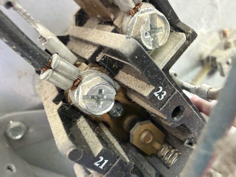 Completed comprehensive heating maintenance visit including furnace inspection per Comfort Care Plan protocol. Addressed customer concern regarding water leakage from air conditioning condenser unit located in basement. Performed thorough system evaluation, inspecting electrical connections and terminal blocks for proper operation and safety. Examined condensate drainage system and identified source of water accumulation at condenser unit. Inspected all accessible components, documented findings with photographs of electrical terminals and drainage components. Provided customer with maintenance recommendations and information regarding available service membership plans for ongoing system care and cost management.