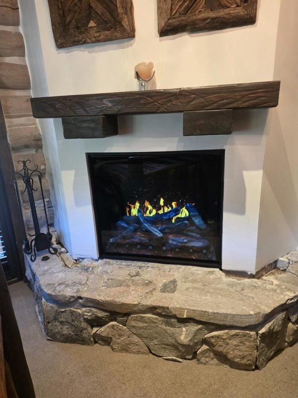 Performed cleaning and startup service on BX36 gas fireplace insert. Cleaned glass front, burner assembly, and log set to remove dust and debris accumulation. Inspected gas connections, pilot assembly, and ignition system for proper operation. Verified flame pattern and color, confirming proper combustion with characteristic yellow flames and blue accent flames on artificial log set. Tested all safety controls and confirmed unit cycling correctly. Fireplace is operating efficiently and safely.