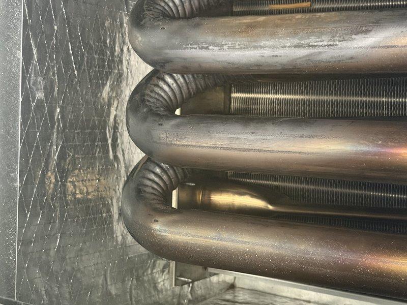 Completed warranty heat exchanger installation on HVAC system. Removed old heat exchanger assembly and installed new replacement unit, ensuring proper alignment of copper tubing and finned sections. Performed diagnostic testing on gas valve connections and electrical components using digital testing equipment to verify proper operation and safety compliance before returning system to service.