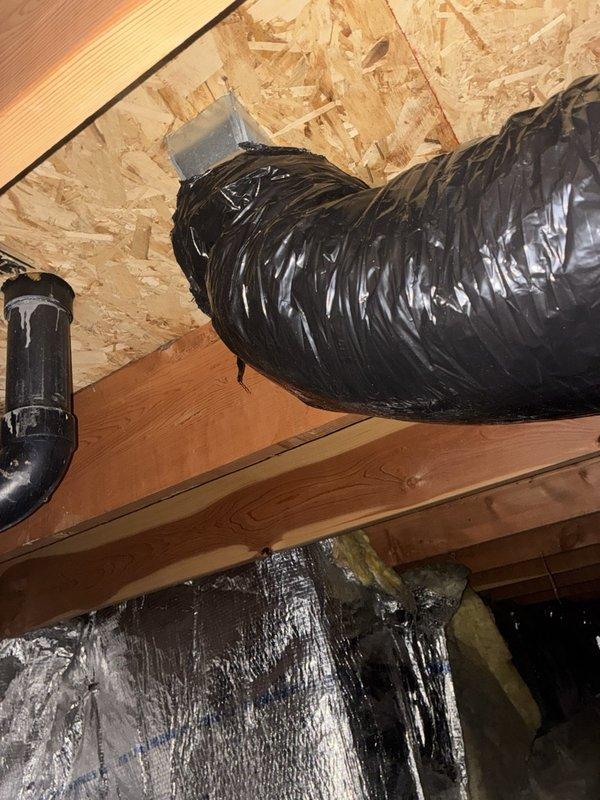 Completed installation of air conditioning add-on system consisting of EL18KCV-036 evaporator coil and CK40CT-49C condenser unit. Installed insulated flexible ductwork throughout basement mechanical room and attic space, routing supply and return air distribution from existing furnace system. Secured all ductwork connections with foil tape and integrated new cooling coil with existing heating equipment to create complete HVAC system capable of both heating and cooling operations.