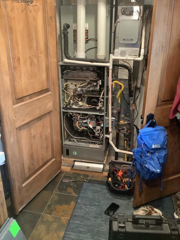 Completed Comfort Care Plan heating maintenance visit on 7-year-old furnace unit located in mudroom off garage. Performed comprehensive seasonal tune-up including inspection of blower assemblies, electrical connections, and refrigerant lines. Removed front access panel to access internal components for thorough cleaning and operational testing. Verified proper function of all system controls and safety devices. Gas fireplace maintenance scheduled as separate appointment to address two first-floor units in family room and living room. All equipment confirmed to be less than 10 years old and operating within normal parameters. No issues reported by homeowner prior to visit. System left in proper working condition with all panels secured.