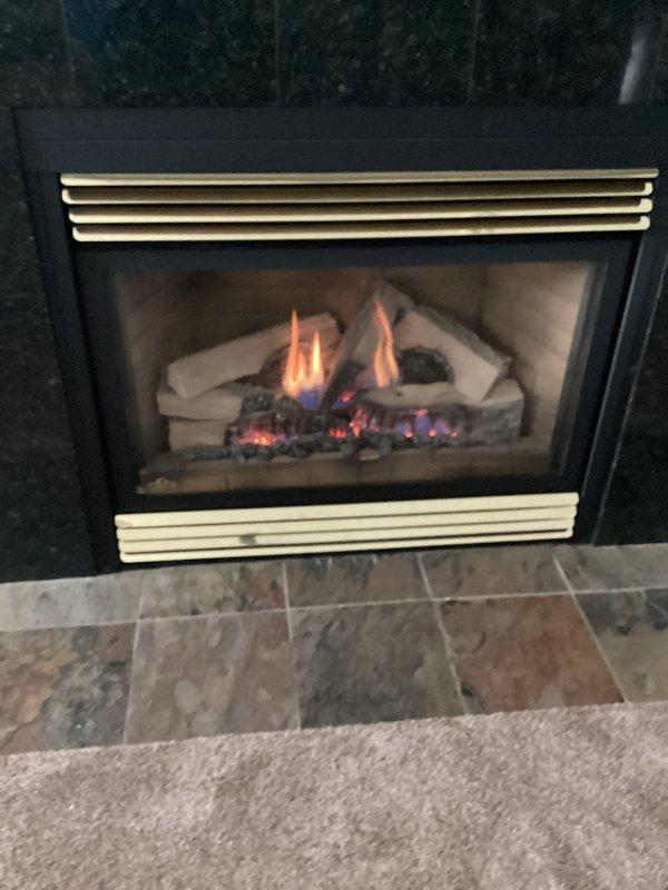 Performed routine maintenance on one gas fireplace insert with no reported issues. Inspected the firebox, ceramic log set, embers, louvered vents, and glass front panel, and verified proper flame pattern and operation. The unit was found clean and free of visible damage, rust, or other anomalies.
