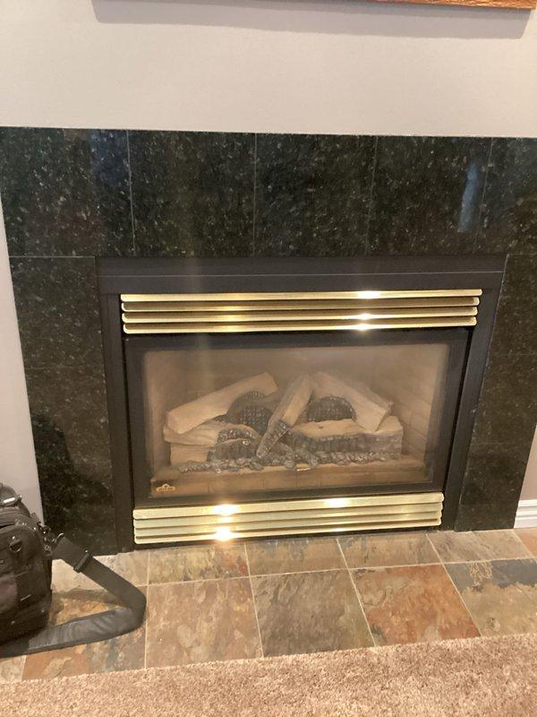 Performed routine maintenance on one gas fireplace insert with no reported issues. Inspected the firebox, ceramic log set, embers, louvered vents, and glass front panel, and verified proper flame pattern and operation. The unit was found clean and free of visible damage, rust, or other anomalies.