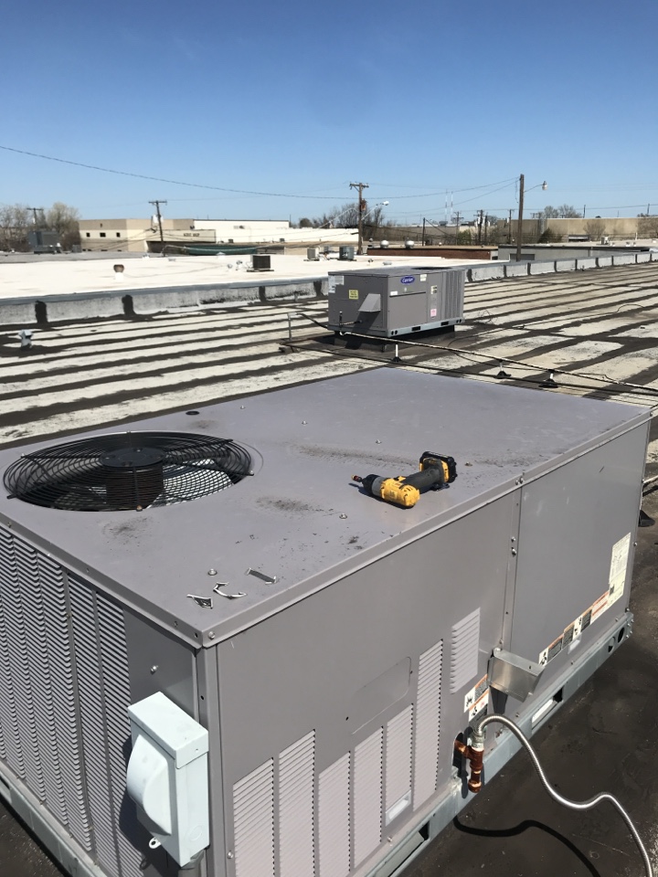 Performing a maintenance check on two Bryant HVAC systems for our customer at their office in Garland, TX. 