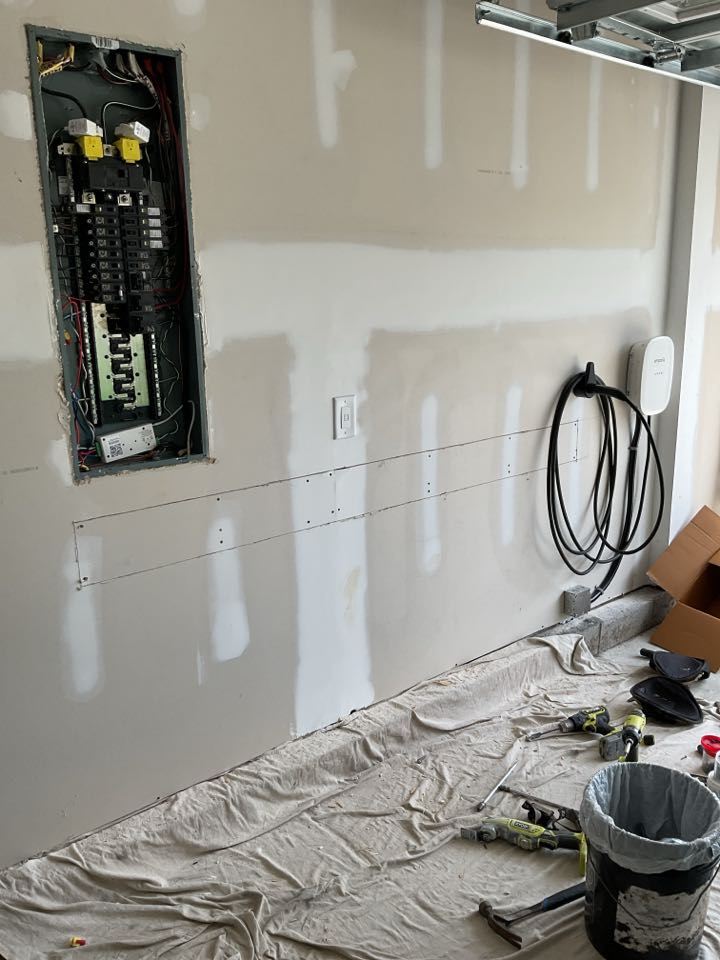 Install new EV charger on energy management system. 