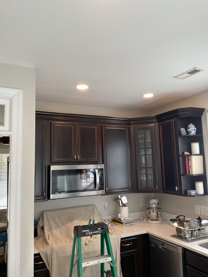 Replace outdoor outlets and light above stove. 