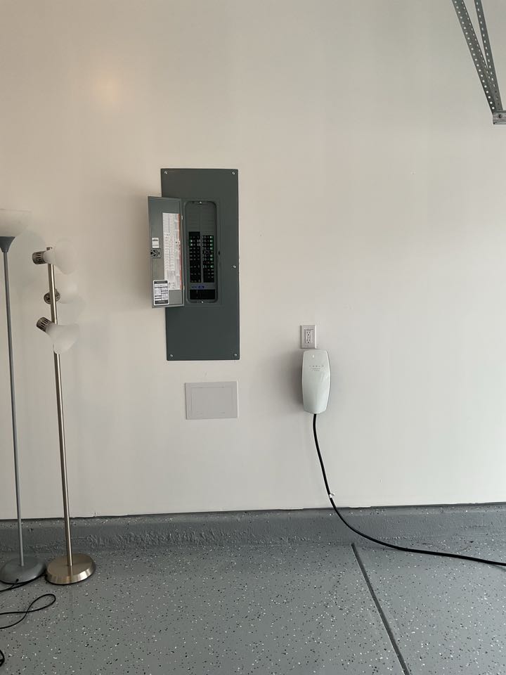 Install new EV charger to garage. 