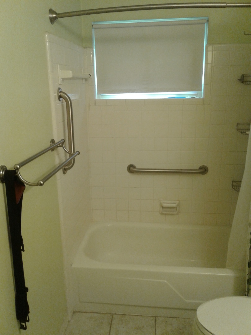 Install 2 grab bars in the bathroom