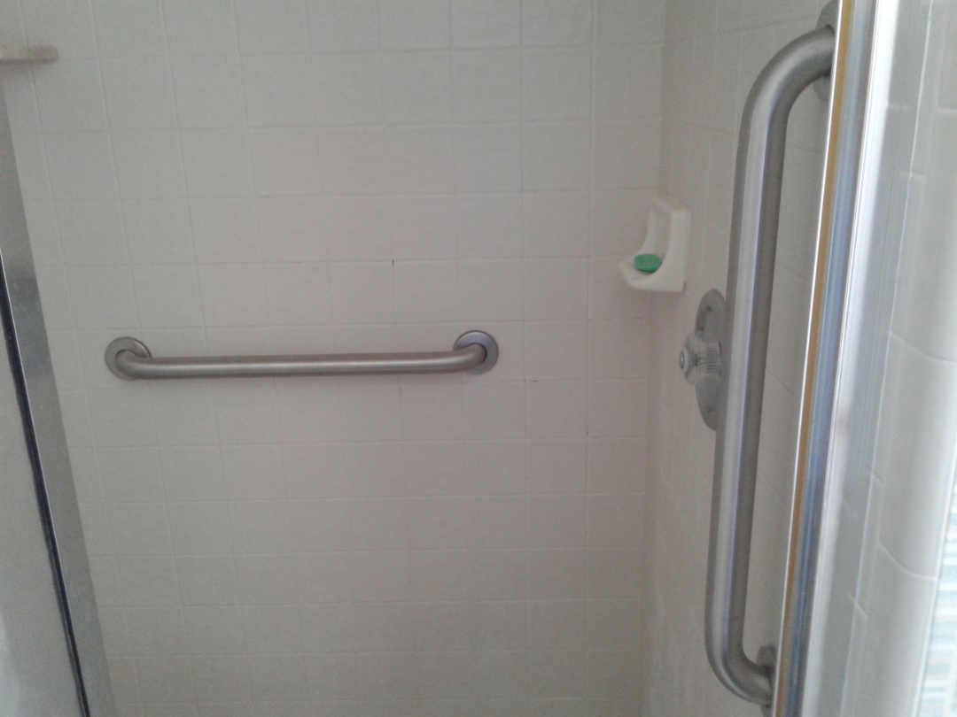 Install two 24in grab bars inside walk in shower