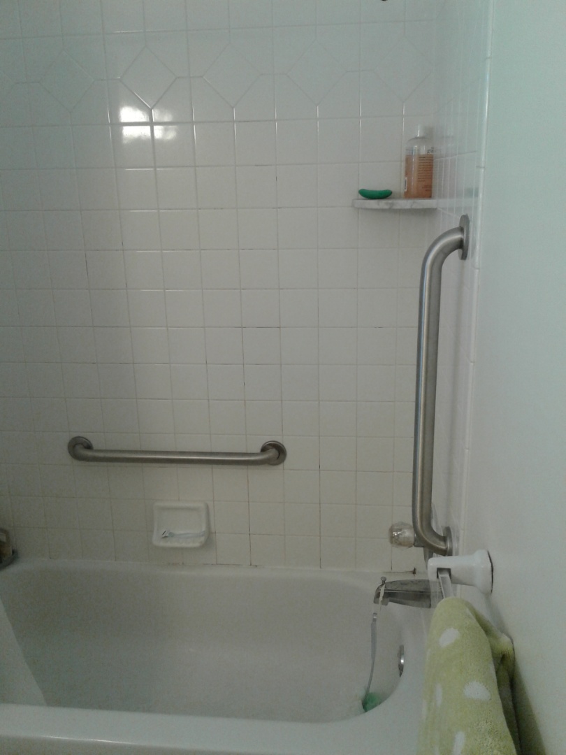 Install two 24 inch grab bars