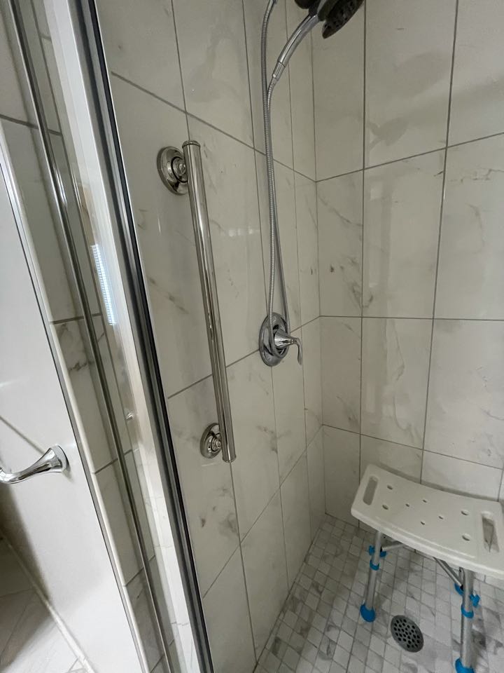 Installed Client supplied grab bars