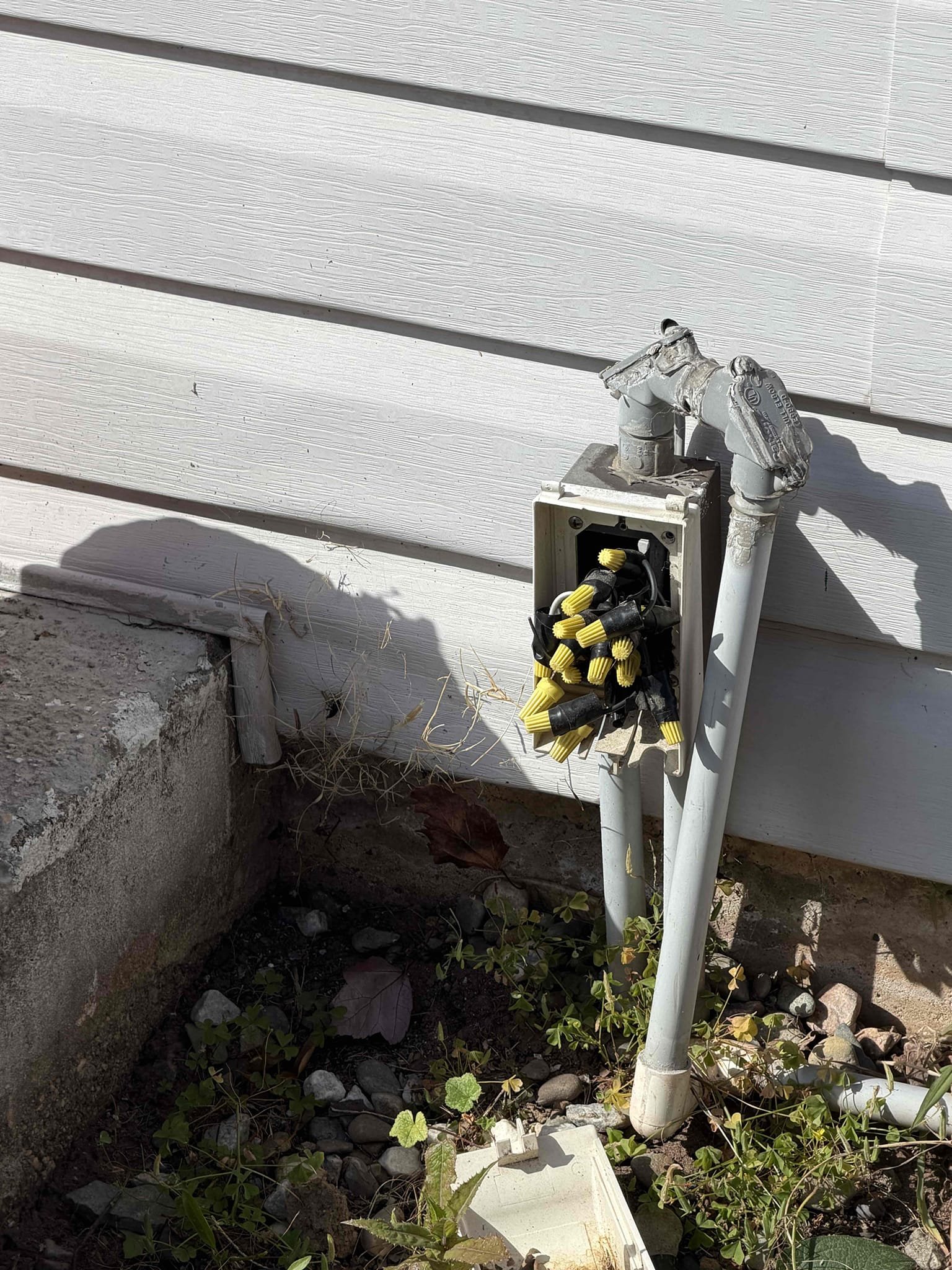 Disconnected live line running underneath the ground that was unsafe. I also provide a pricing to install the two new receptacles on the front of the house where the wires are sticking out. Also provided pricing to replace the main service cable in the back of the home with pulling a permit. Disconnected live line running underneath the ground that was unsafe. I also provide a pricing to install the two new receptacles on the front of the house where the wires are sticking out. Also provided pricing to replace the main service cable in the back of the home with pulling a permit.