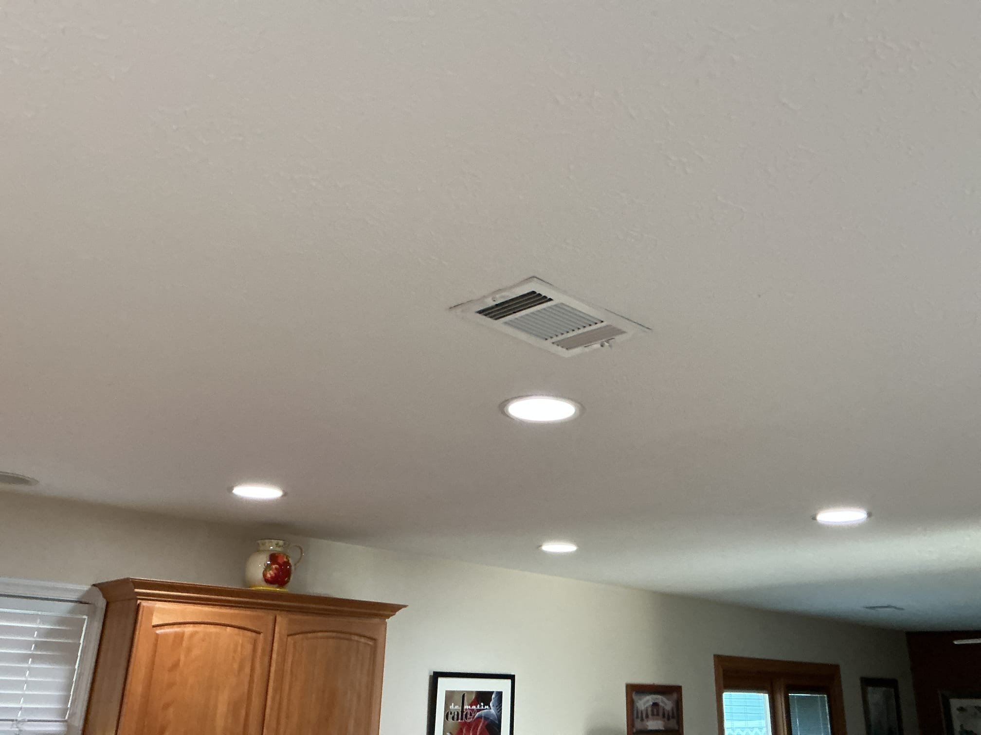 This solution includes the installation of a new dimmer rated for the LED lights in the kitchen. In addition we have replaced the dining room dimmer.