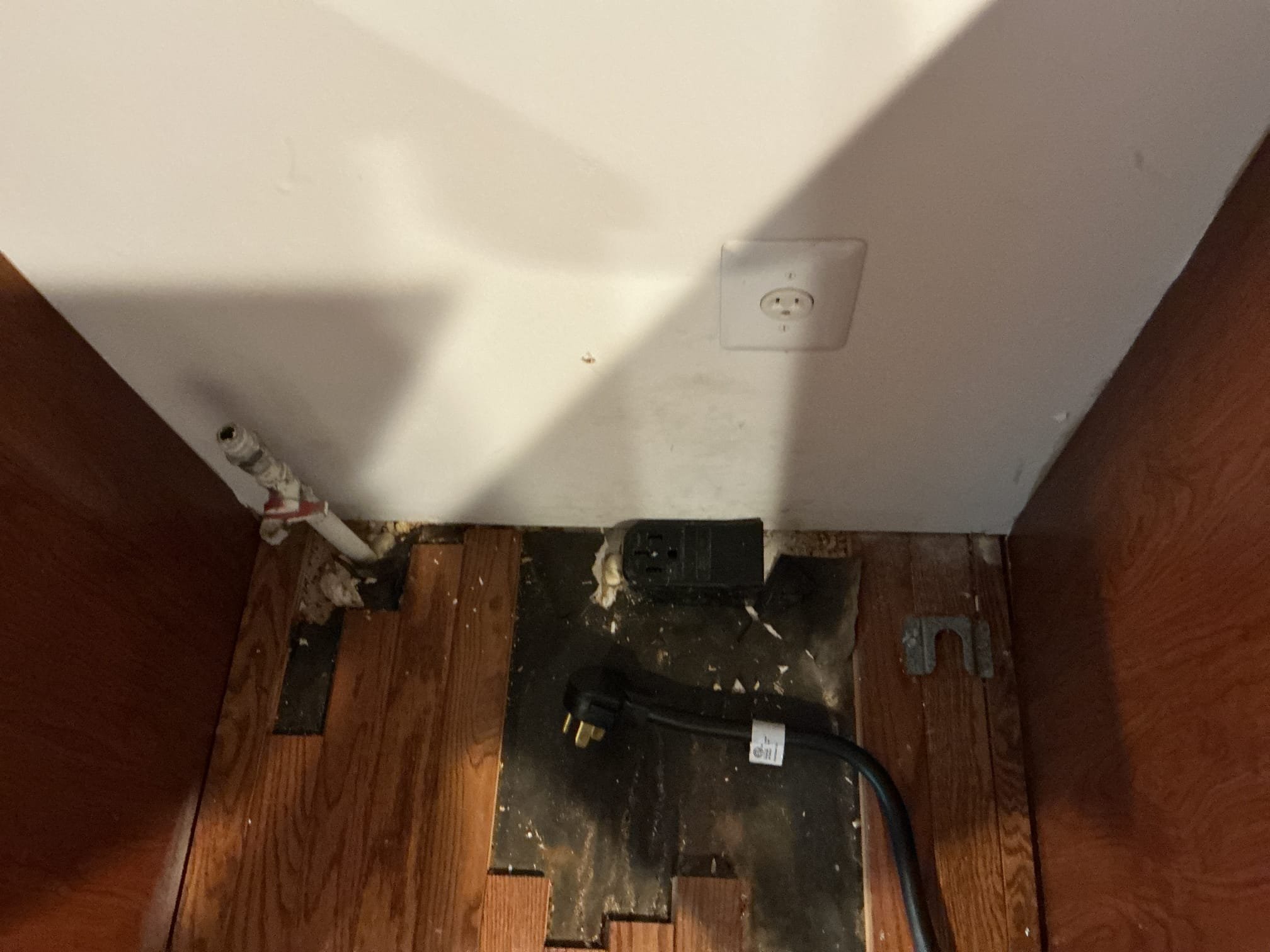 This solution includes the replacement of the existing range receptacle.
We have restored power the stove. We replaced the existing breaker and we have cut out damaged portions of wiring at the receptacle and replaced the receptacle.

We highly recommend having repairs to the sub panel made. We have left the breaker off that controls the sub panel.