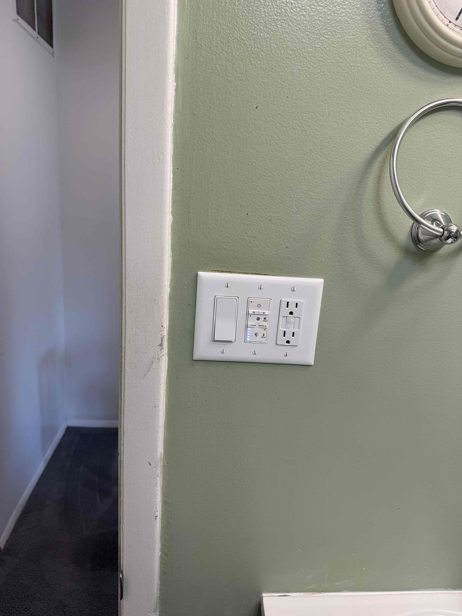 Replace customer supplied bathroom exhaust fan
Installation of new three gang switch bank in place of the existing two gang
Installation of new GFCI receptacle as well as a new switch for the vanity light and customer supplied smart switch for fan.
Install surge protector 