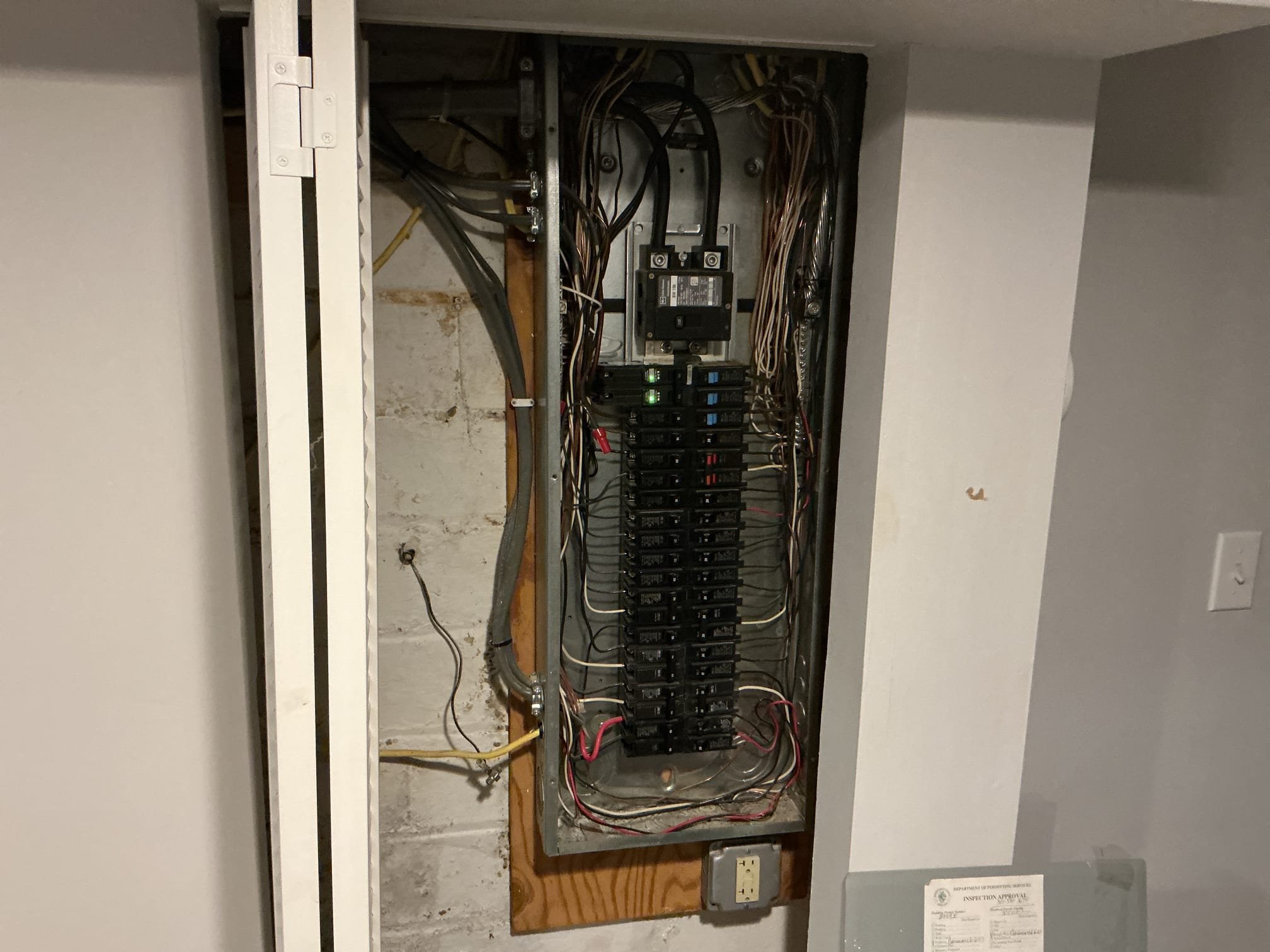 This solution includes the replacement of the existing gfci receptacles in the kitchen and replacing an additional receptacle with a gfci. Also includes water heater bonding. This includes arc fault breakers for the original cloth wire circuits.

We have installed 3 gfci receptacles in the kitchen. Additionally we have bonded the water heater and have installed 5 Arc fault breakers.