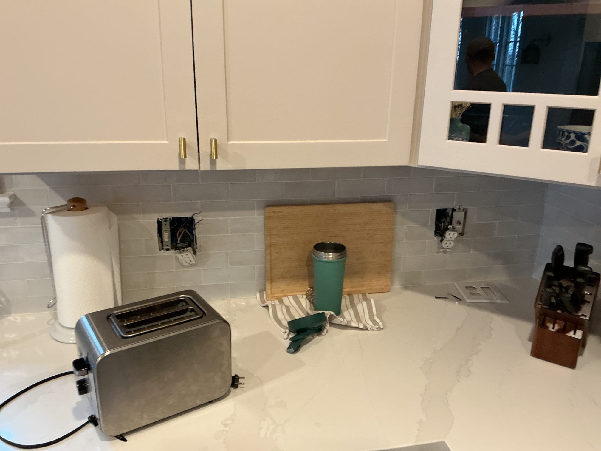 This solution includes the replacement of the existing gfci receptacles in the kitchen and replacing an additional receptacle with a gfci. Also includes water heater bonding. This includes arc fault breakers for the original cloth wire circuits.

We have installed 3 gfci receptacles in the kitchen. Additionally we have bonded the water heater and have installed 5 Arc fault breakers.