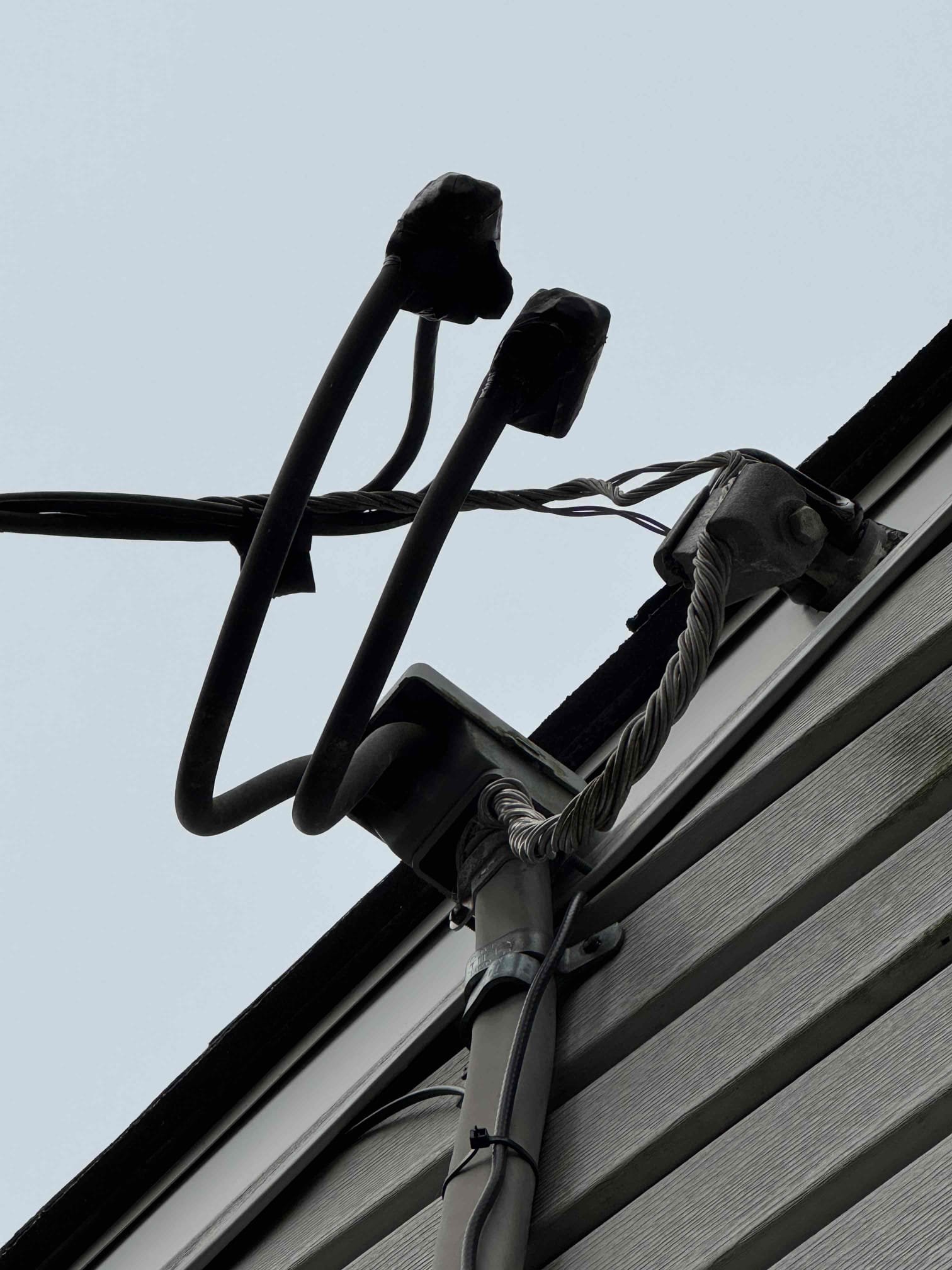 Install Surge protector inside main panel by tapping to main lugs and securing device within the load center